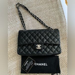 Chanel Medium Classic double flap bag in black lambskin leather